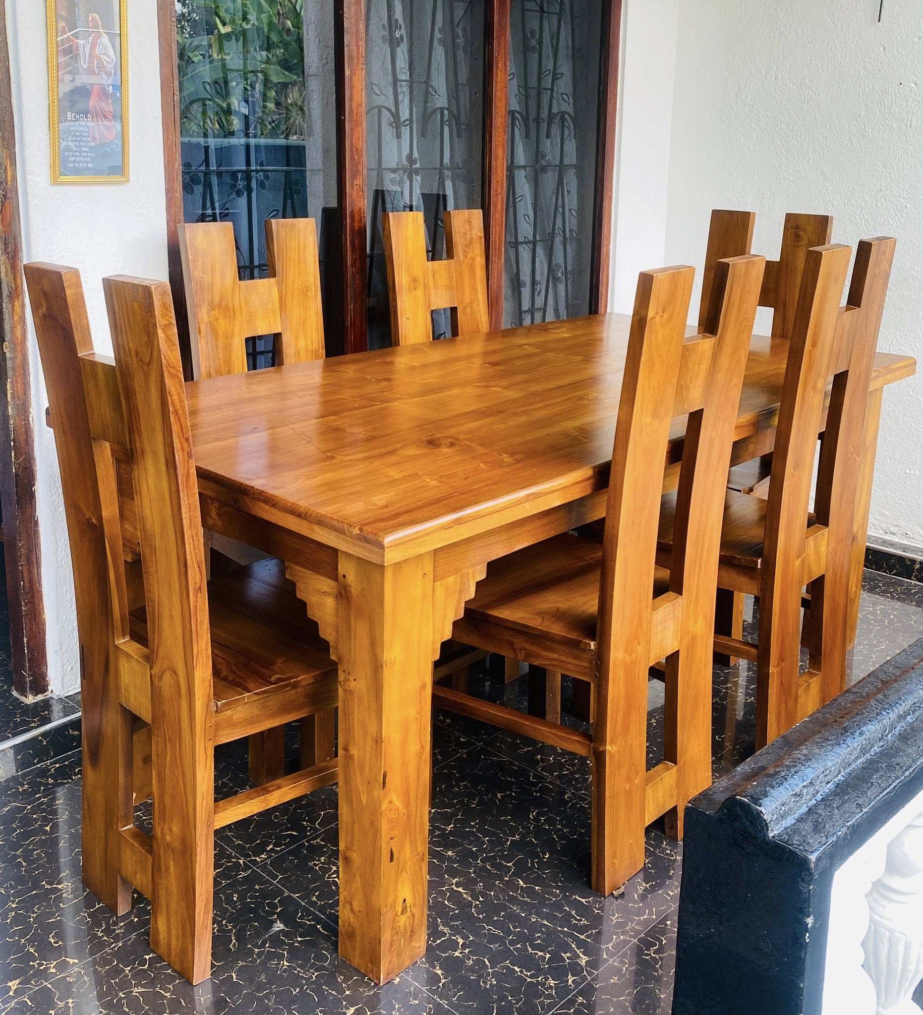 Used teak dining table with 6 chairs