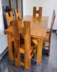 Used teak dining table with 6 chairs