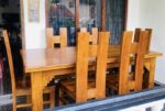 Used teak dining table with 6 chairs