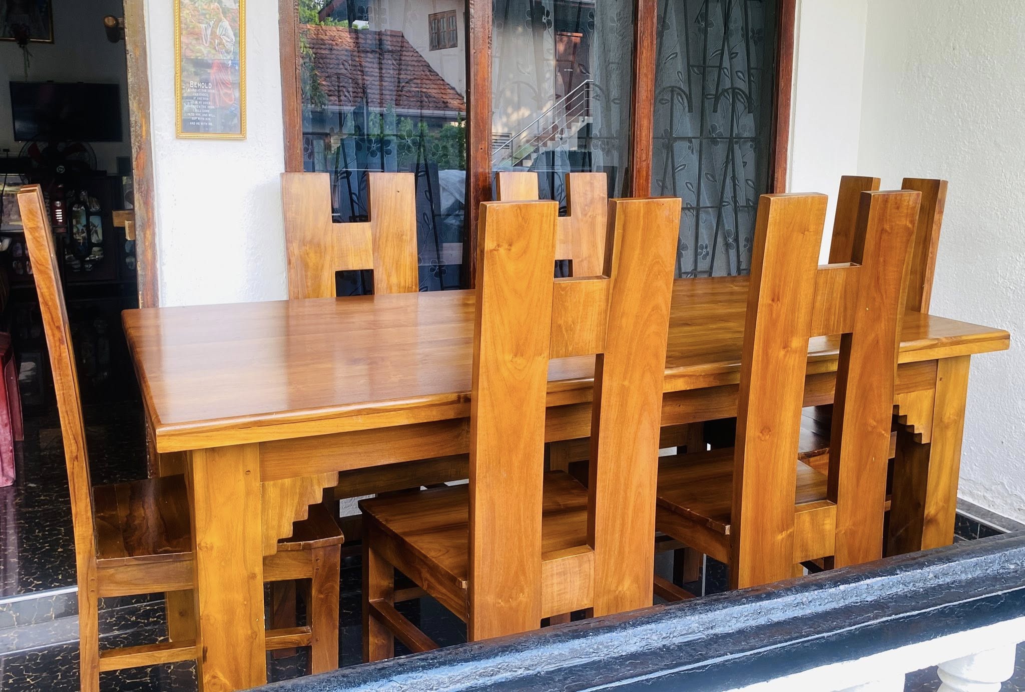 Used teak dining table with 6 chairs