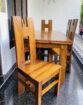 Used teak dining table with 6 chairs