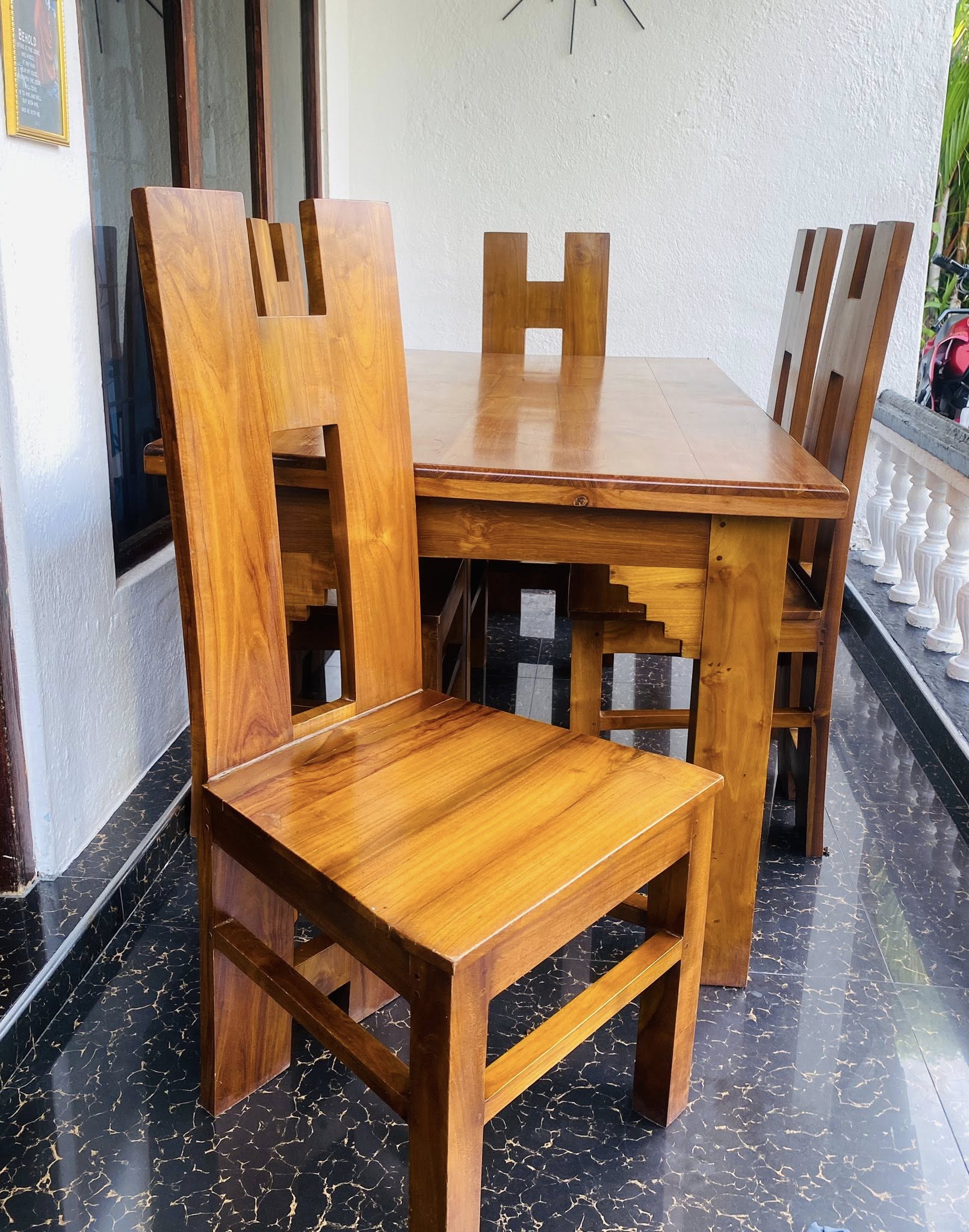 Used teak dining table with 6 chairs