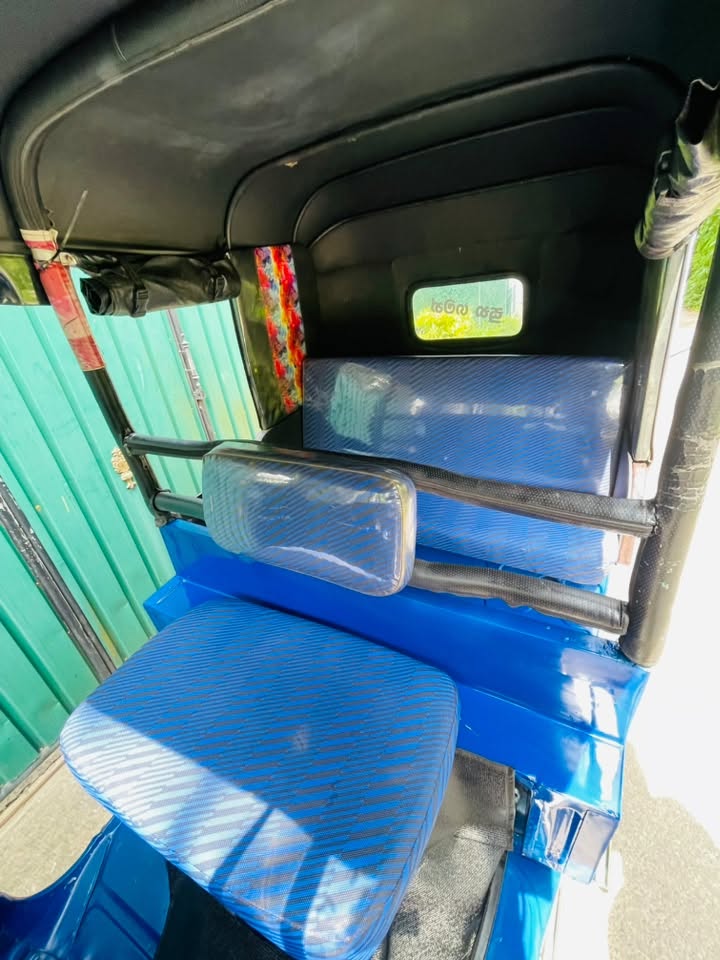 Bajaj re three wheel