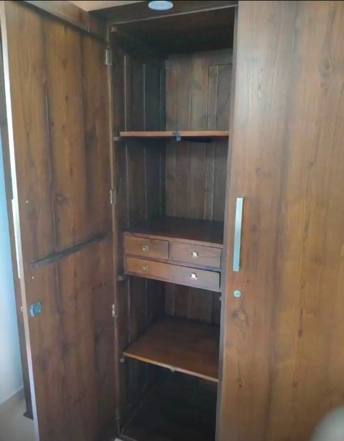 Solid Teak 4-door wardrobe for sale.