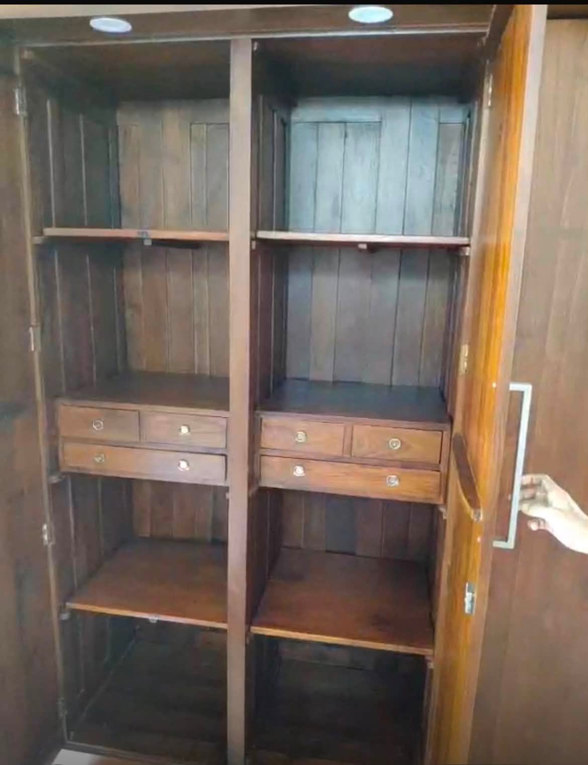 Solid Teak 4-door wardrobe for sale.