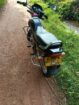 bajaj caliber 115