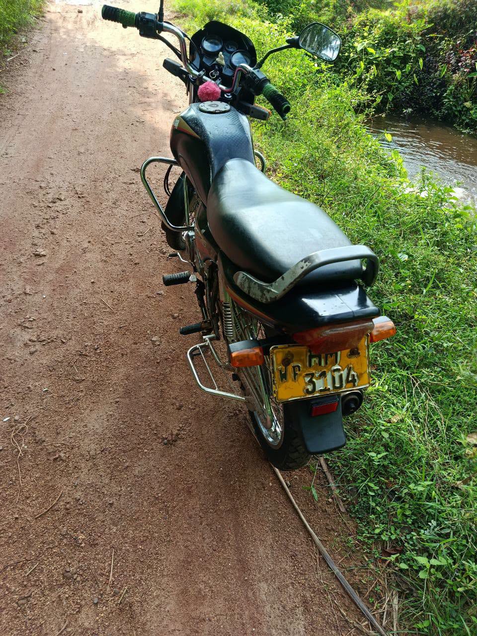 bajaj caliber 115